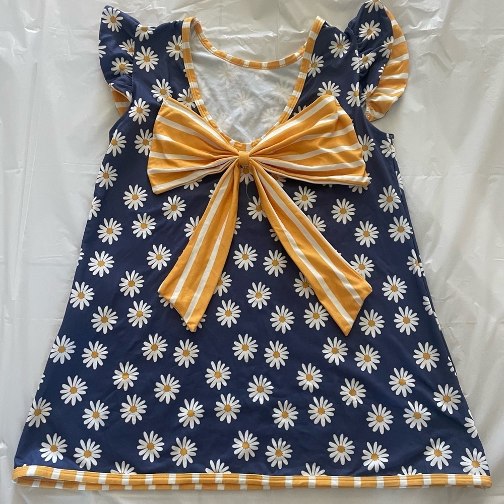 Wellie Kate daisy bow back dress 
Nwt